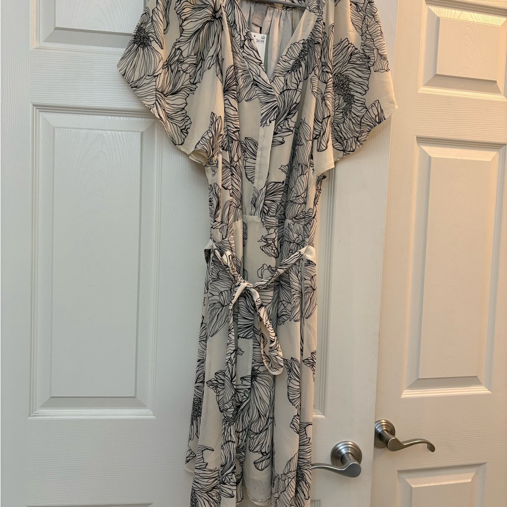 Elegant Black and Cream Floral Dress